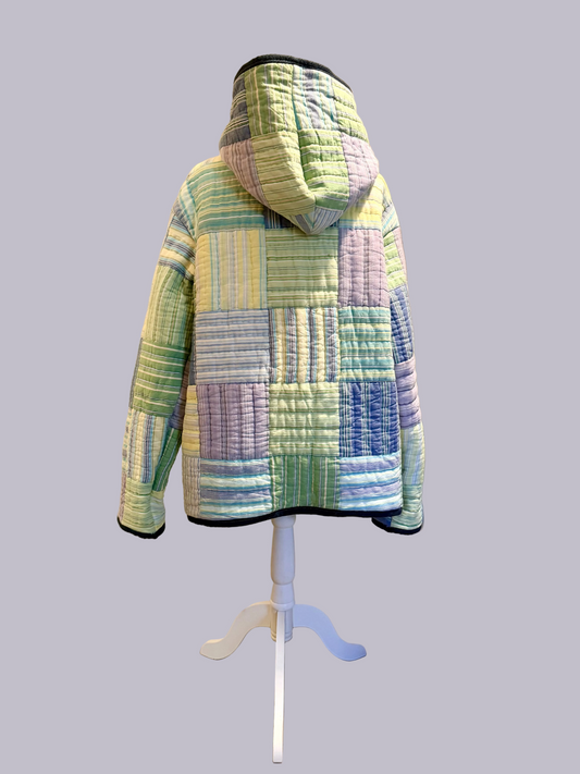 Back view of handmade patchwork quilt jacket made from reclaimed quilt