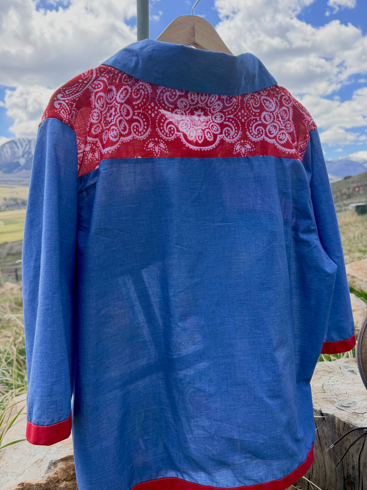 Handmade blue shirt with red and white pattern