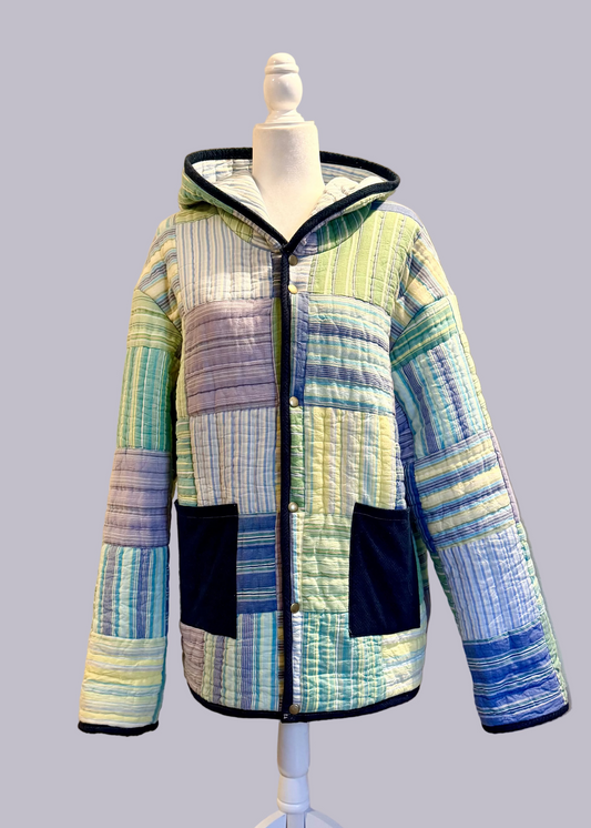 Handmade patchwork quilt jacket with snap button closure and hood