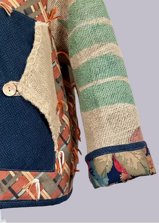 Detail of sleeve showing reclaimed coffee sack burlap textile on handmade jacket