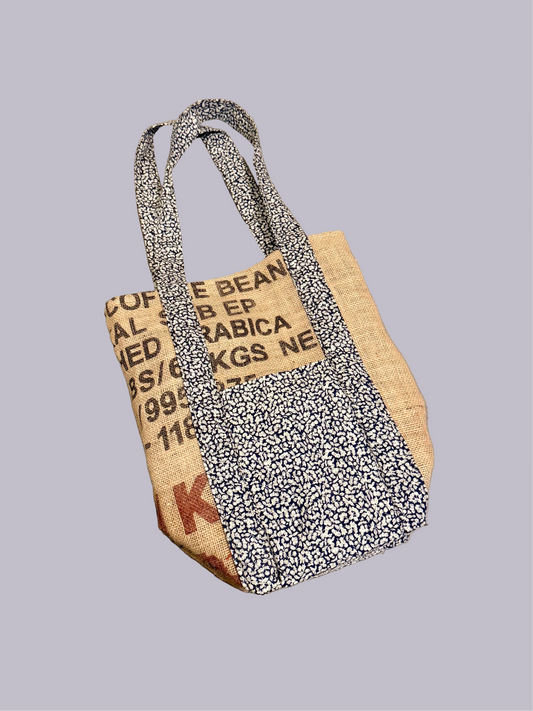 An upcycled handmade coffee sack tote by Feral Friends.