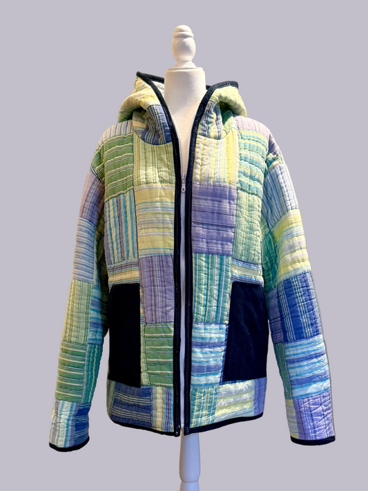 Handmade upcycled quilt jacket with hood and zipper front in patchwork blue green tones