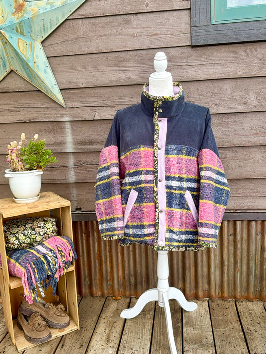 Pink plaid wool blanket boxy chore coat on a mannequin, front view