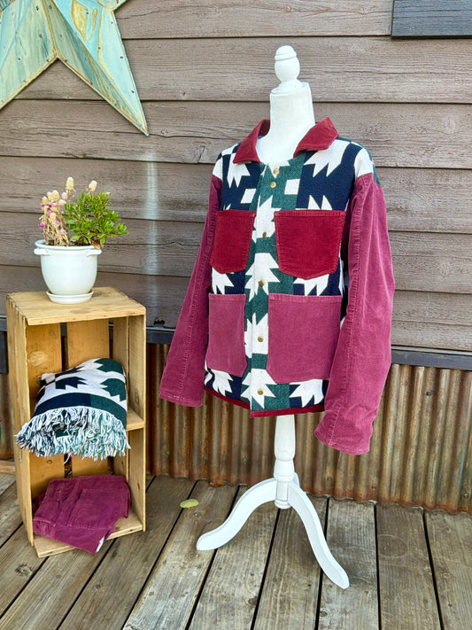 Southwestern blanket camp coat with burgundy corduroy on a mannequin, front view