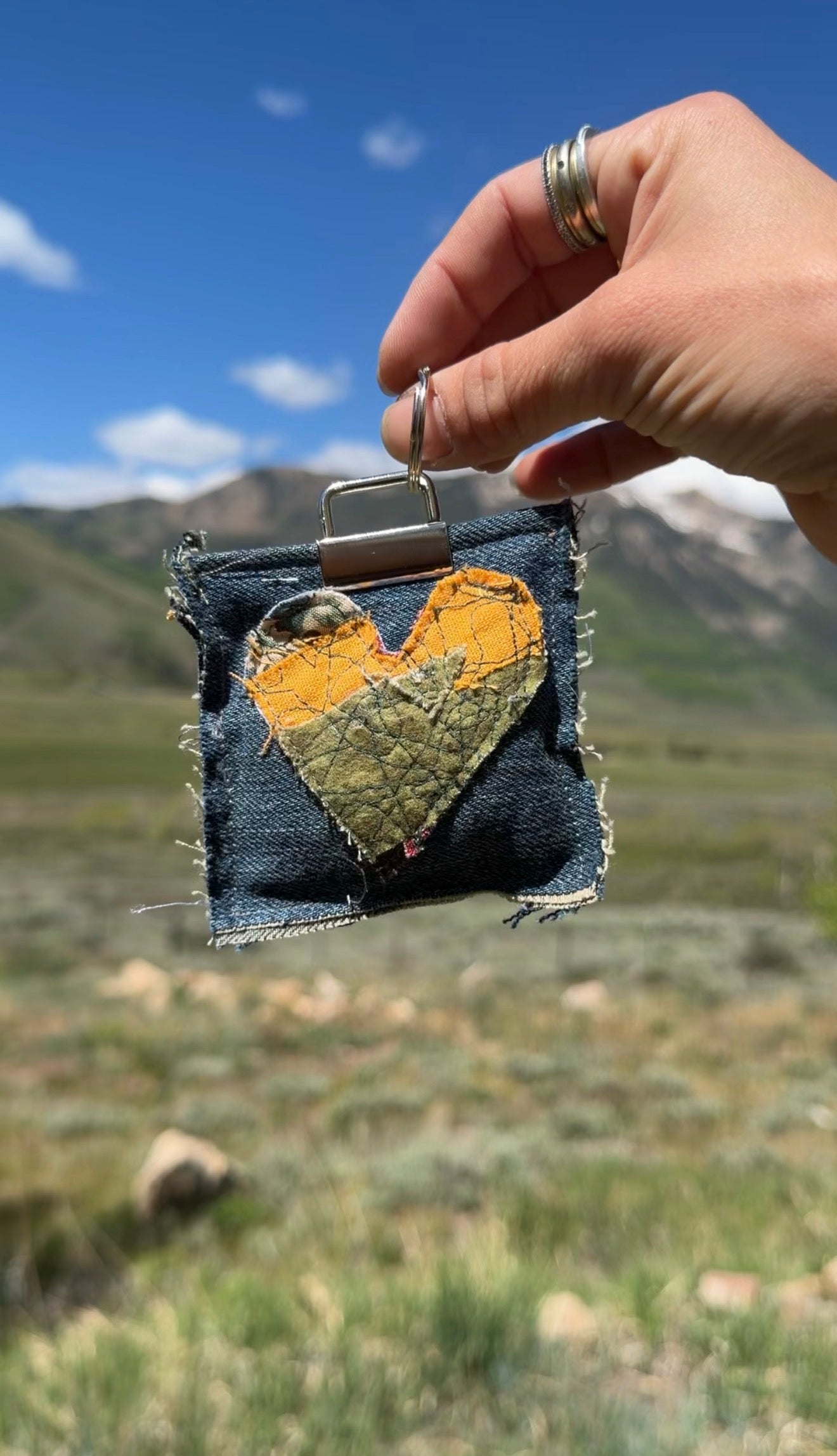 Wear your heart on your keys! These sweet little heart keychains are stitched together from reclaimed fabric scraps — denim, quilting cotton, vintage prints, and more. A heartfelt gift or a daily reminder of something you love.